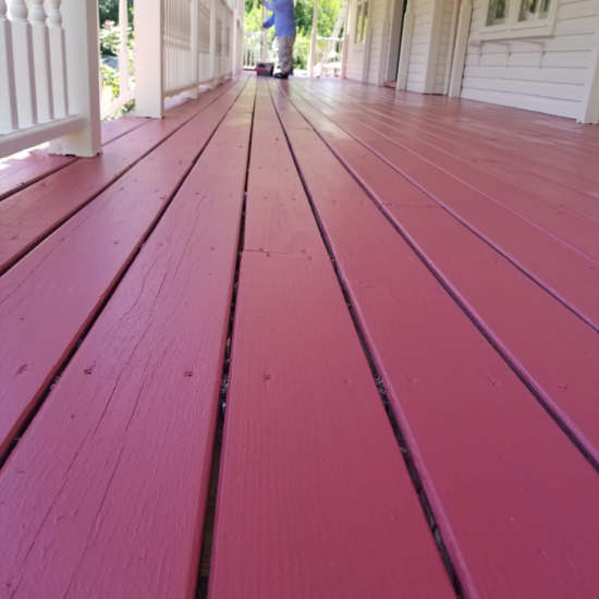 Outdoor deck in Leesburg freshly painted with weather-resistant paint to withstand seasonal changes.