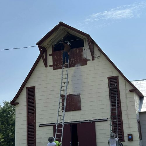 Classic red barn in Winchester restored with a fresh coat of weather-resistant paint.